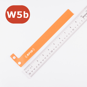 Wide Button Snap NFC Bracelet.
Thick, 26mm wide band, with adjustable holes and one-time button closure. (Holes not pictured.)
